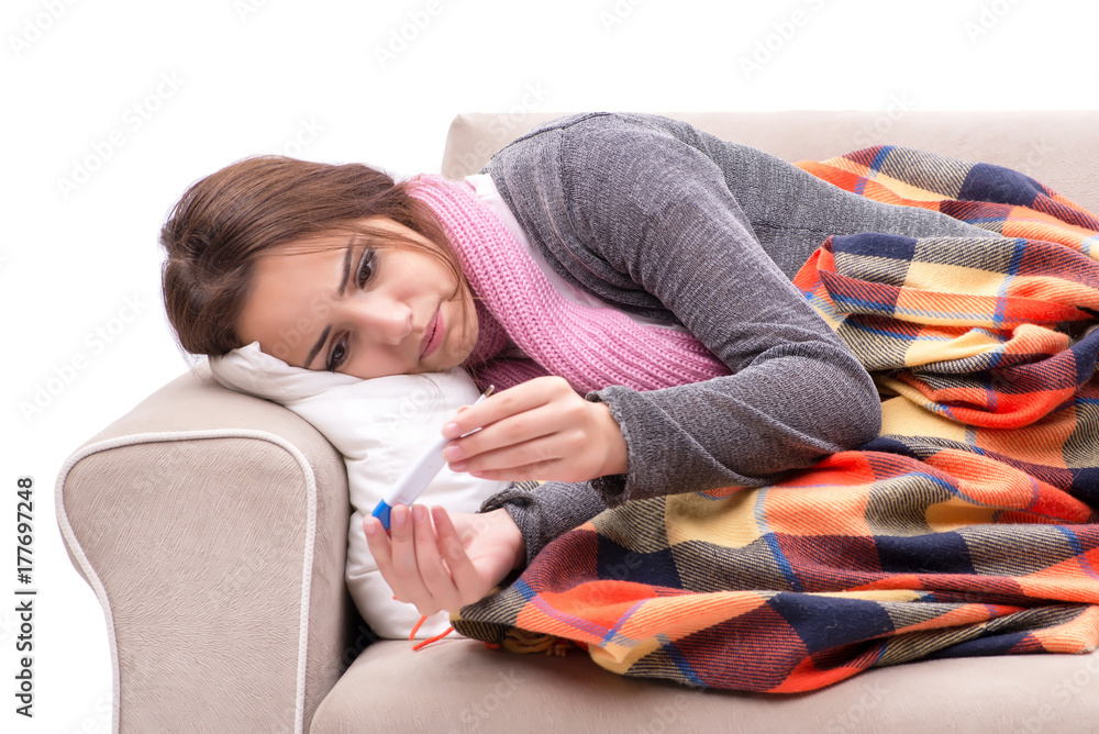 Obraz premium Teenager suffering from cold sitting on coach