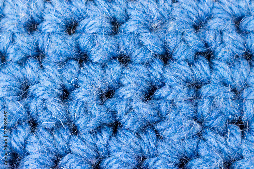 Fototapeta premium Handmade blue knitting wool texture background