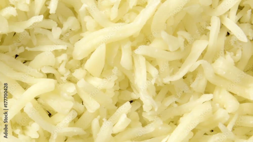 Overhead slider shot of grated swiss cheese
Overhead slider shot of grated swiss cheese