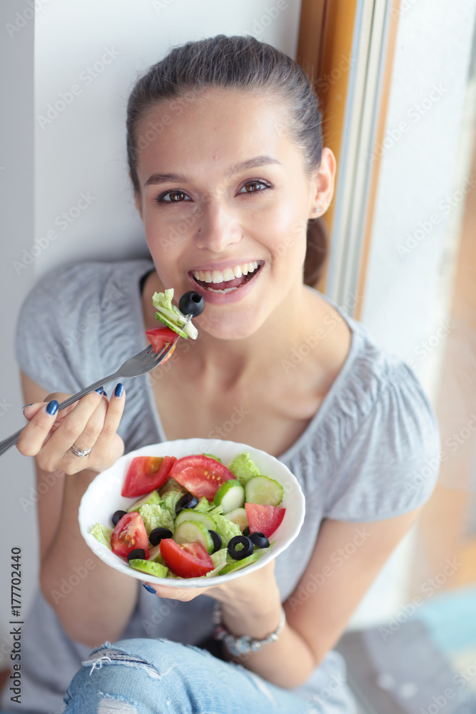 A beautiful girl eating healthy food. Beautiful girl A beautiful girl eating healthy food. Beautiful girl