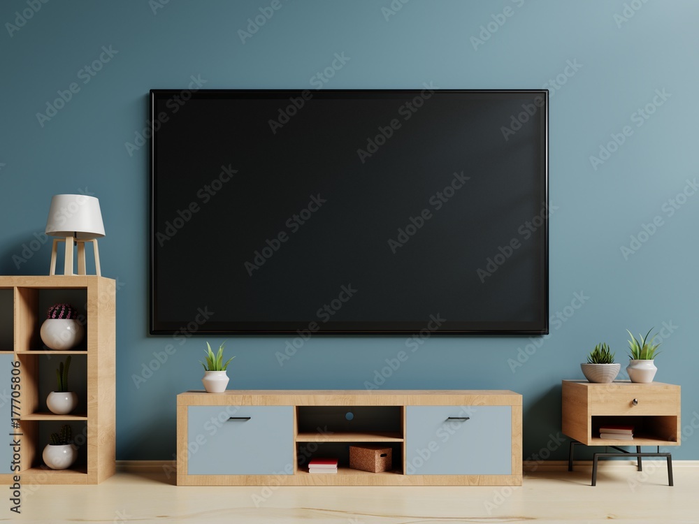 Smart TV on stand and wall blue background. 3d rendering