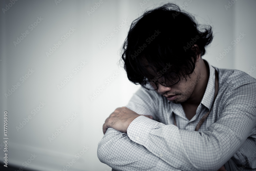 business man is stressed from his work. depression and anxiety concept. business man is stressed from his work. depression and anxiety concept.