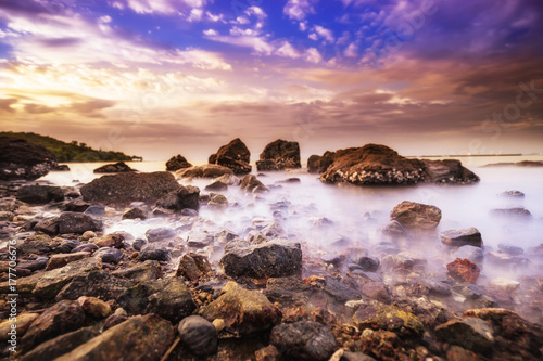 surreal seascape on sunset time with long exposure speed shutter