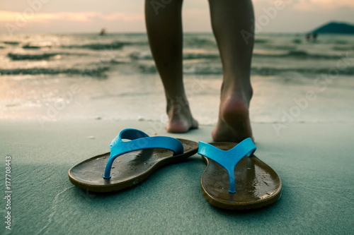 The woman's feet are running down to the sea, Concept sea.
