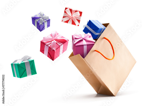 Gift boxes pop out from shopping bag