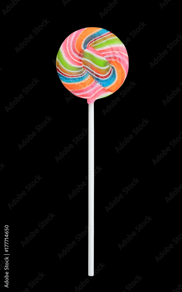 Rainbow color lollipops on black background. Rainbow color lollipops on black background.