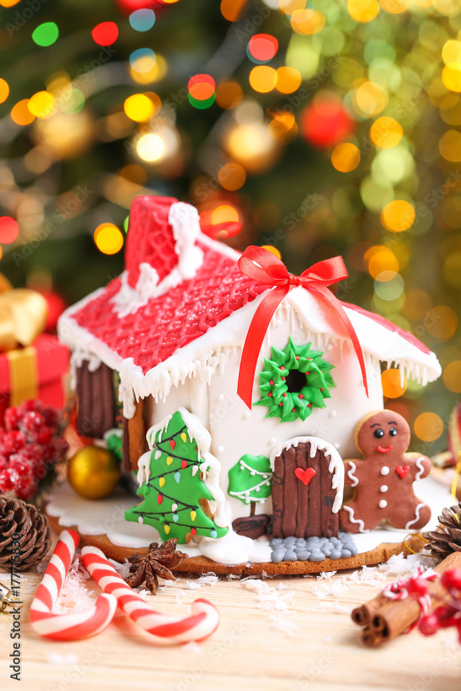 Christmas gingerbread house on lights background