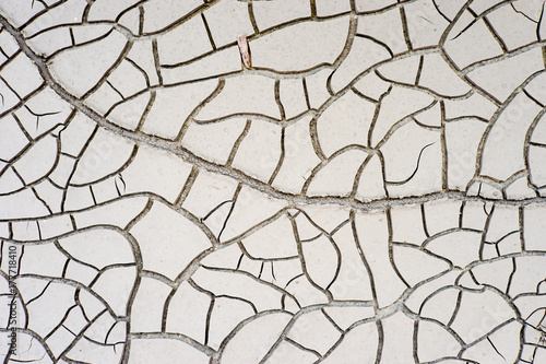 Dry soid after flood. Crack surface of dry soil. Abstract crack surface of mud.