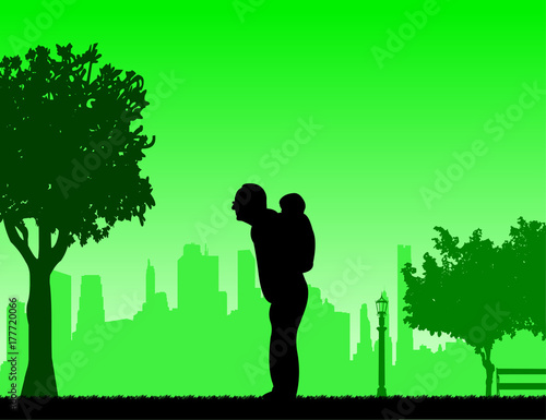 Grandfather carrying a grandchild piggyback in park, one in the series of similar images silhouette