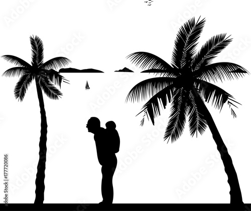 Grandfather carrying a grandchild piggyback on the beach, one in the series of similar images silhouette