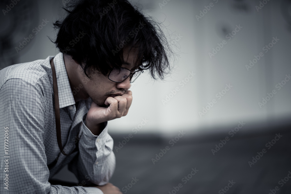 business man is stressed from his work. depression and anxiety concept. business man is stressed from his work. depression and anxiety concept.