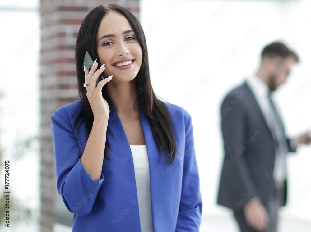Young brunette businesswoman or student girl looking at camera. Young brunette businesswoman or student girl looking at camera.