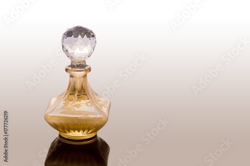 Vintage Old Fashion Glass Bottles Of Aromatic Arabic Oud Oils Perfume With Crystal Clear Ball Shape Dropper Isolated On White Background. Studio Shot Aromatherapy Concept. Blank Space For Text