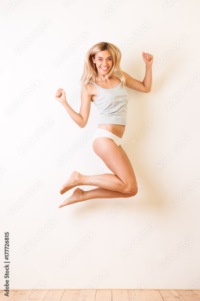 Full length portrait of a happy excited girl Full length portrait of a happy excited girl
