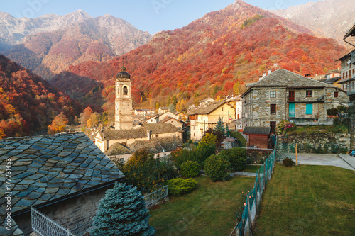 Piedicavallo, Italy - October 20, 2017: Rustic alpine village of Piedicavallo in the autumn season between the Italian Alps photo