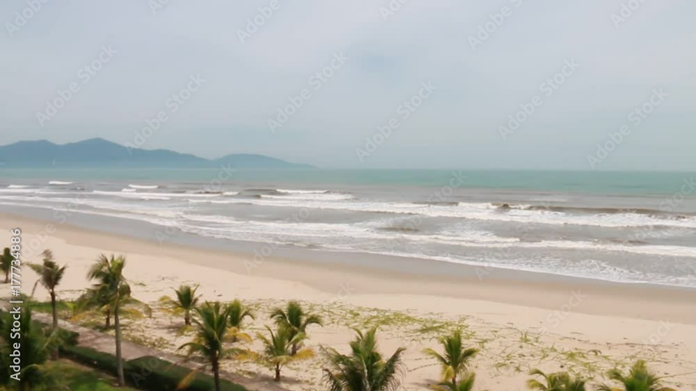 Beach in summer holiday, vacation in sunny light background, Inspiration tropical sea beach, landscape palm and sandy beach with romantic place for relaxing traveler in Da Nang City, Vietnam. Beach in summer holiday, vacation in sunny light background, Inspiration tropical sea beach, landscape palm and sandy beach with romantic place for relaxing traveler in Da Nang City, Vietnam.