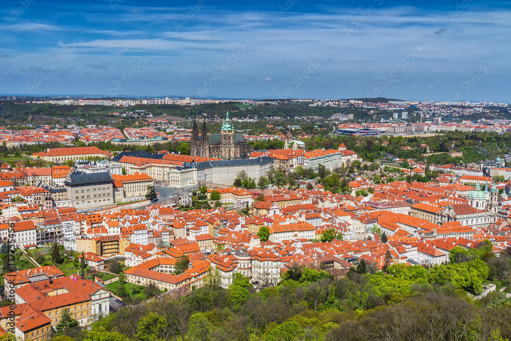 Skyline aerial view of Prague old town, Charles bridge, Prague Castle and St Vitus Cathedral and red roofs. Prague, Czech republic.