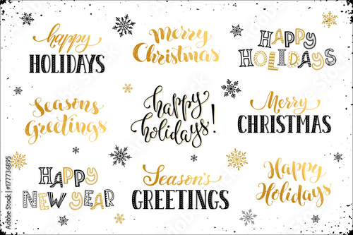 Hand written New Year phrases. Greeting card text with snowflakes isolated on white background. Happy holidays lettering in modern calligraphy style. Merry Christmas and Seasons Greetings lettering.