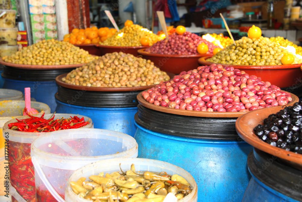 Piickled olives and pepper on a traditional Moroccan market, Rabat, Morocco