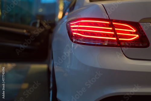 Car detailing series: White car taillight at night