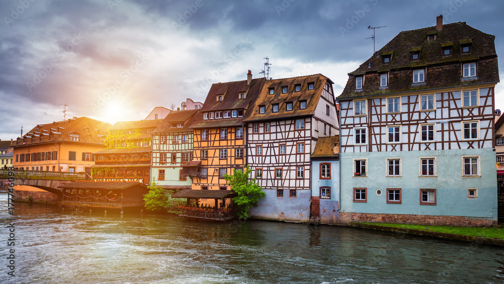Beautiful view of the historic town of Strasbourg, colorful houses on idyllic river. Strasbourg, France