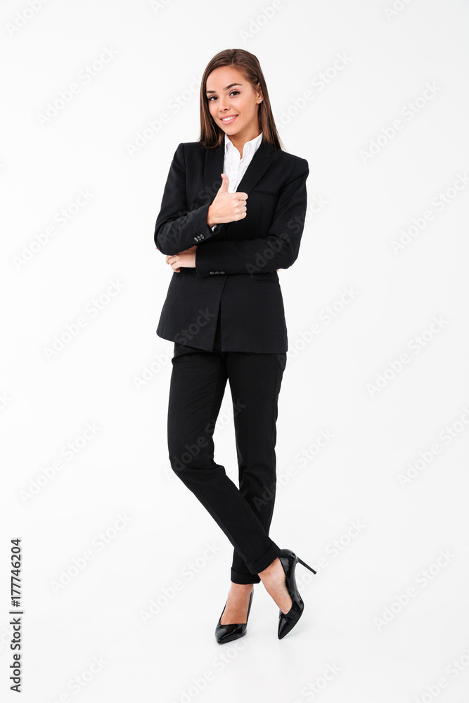 Cheerful business woman showing thumbs up Cheerful business woman showing thumbs up