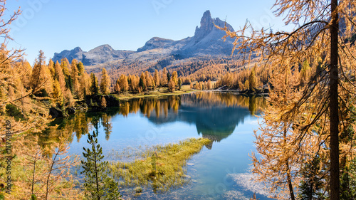 Dolomites. Autumn colors and reflections. The mountain dresses in the fall