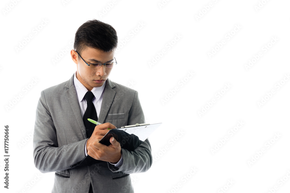 Portrait of a young business man writingl report. Isolated on white background Portrait of a young business man writingl report. Isolated on white background