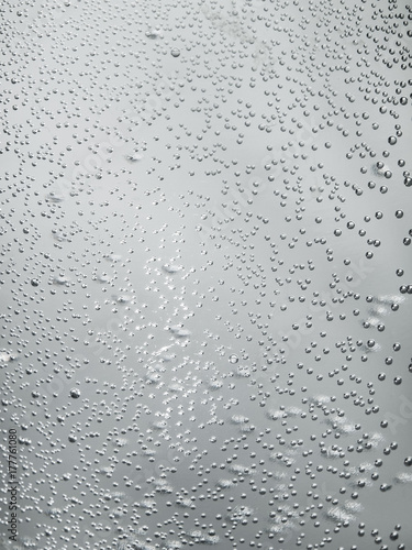 Bubbles in water, rain drops on glass, abstract background