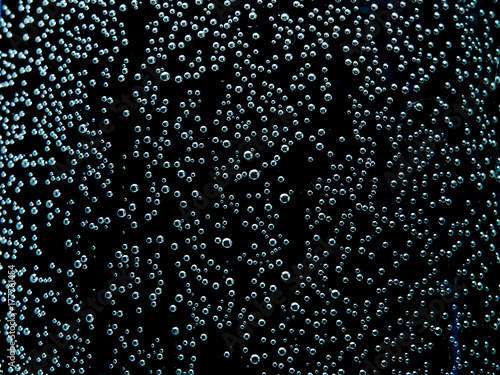 Bubbles in water, rain drops on glass, abstract background