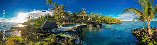 Panoramic holoidays location with coral reef and palm trees, Upolu, Samoa Islands.