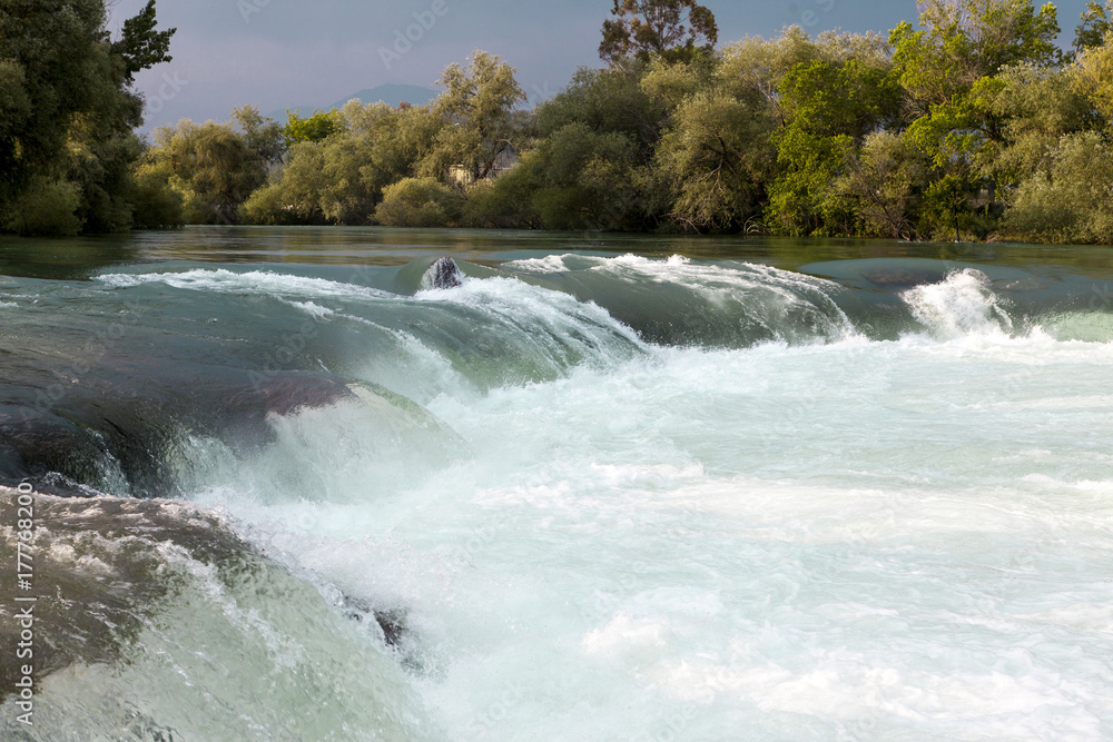 Mountain river, beautiful mountain shoal water. Water rapids. Mountain river, forest green rapid waterfall Mountain river, beautiful mountain shoal water. Water rapids. Mountain river, forest green rapid waterfall