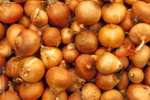 Onions closeup on the village market . Greece.