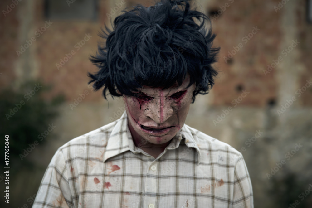 scary disfigured man with a cleaver scary disfigured man with a cleaver