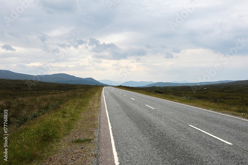 Empty road leading to distance in Scotland highlands