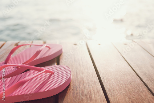 A pair of flip flops on the pier