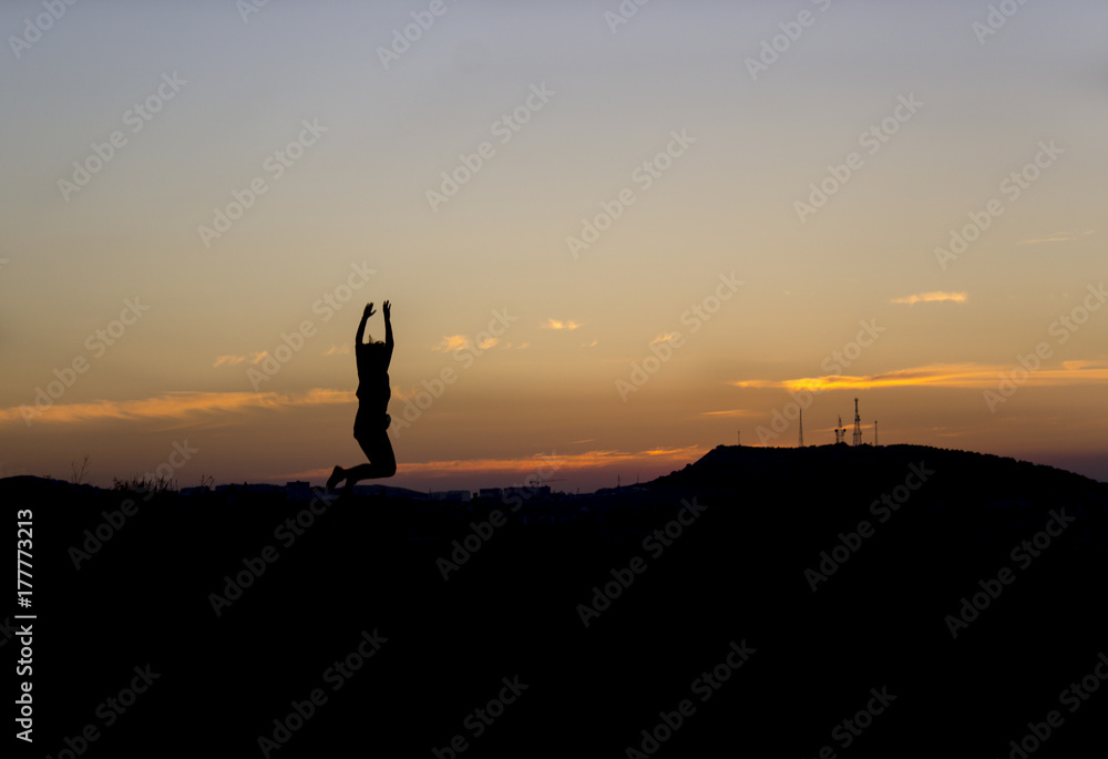 silhouette of person against a beautiful sunset .travel photos