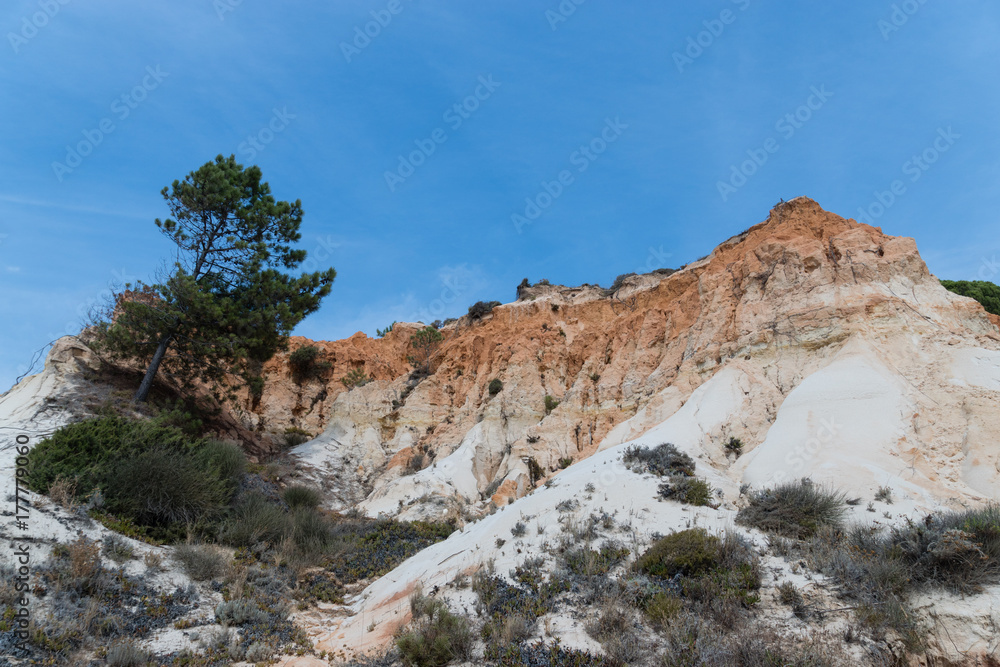 Red mountains in Algarve, south of Portugal
