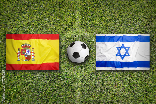 Spain vs. Israel flags on soccer field