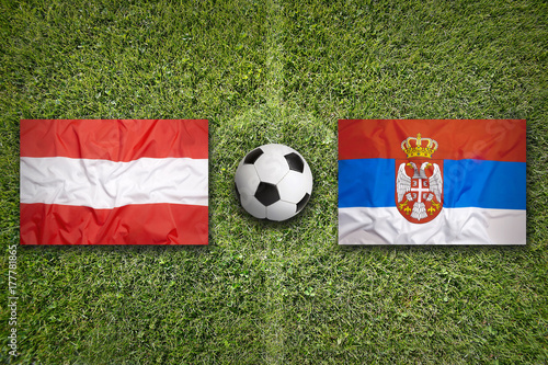 Austria vs. Serbia flags on soccer field