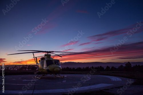 Helicopter in sunset