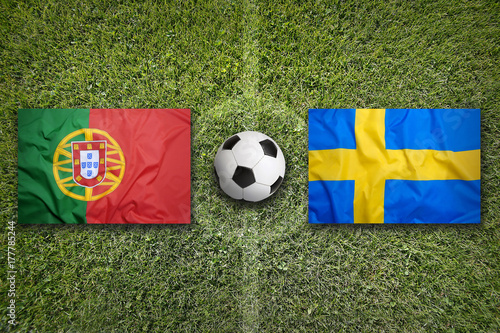 Portugal vs. Sweden flags on soccer field