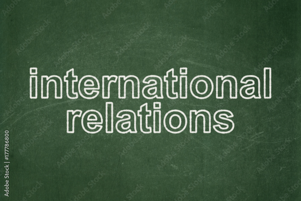 Obraz premium Politics concept: International Relations on chalkboard background