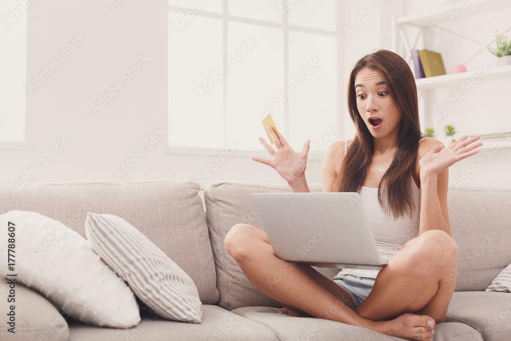 Excited woman shopping online with credit card Excited woman shopping online with credit card