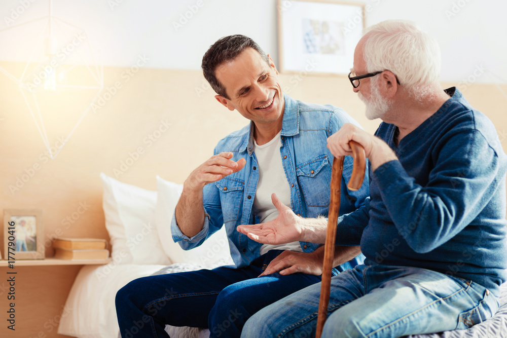 Fototapeta premium Profile photo of mature male that welcoming his son