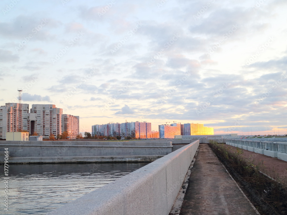 embankments, canals, urban blocks in the evening on the coast