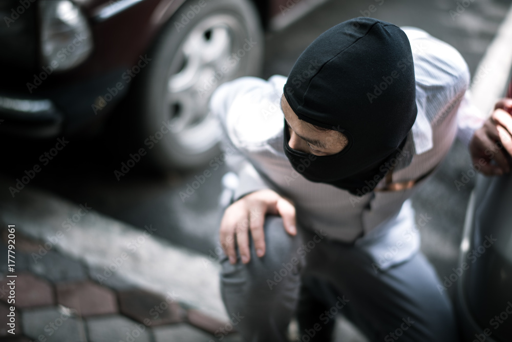 robber in black mask. robbery and crime concept. robber in black mask. robbery and crime concept.