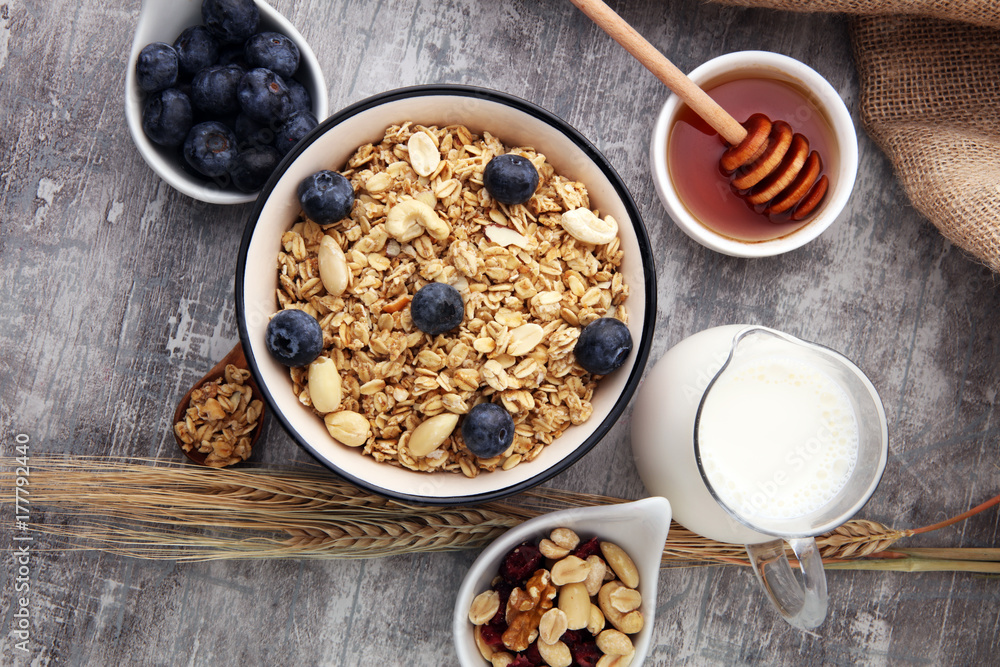 Oat flakes with milk, honey, blueberries, raspberries and nuts. Oat flakes with milk, honey, blueberries, raspberries and nuts.