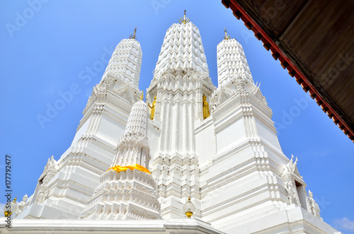 Blue sky and sunlight at Mahathat Woravihara temple, Petchburi, Thailand. photo