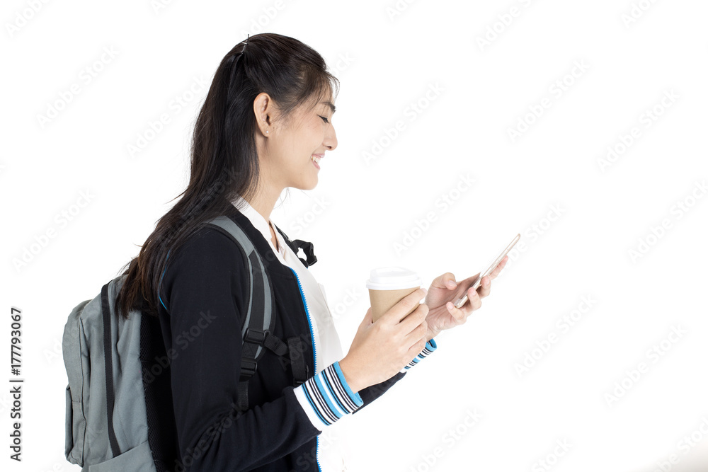 Portrait of Beautiful Young Asian Woman student using smartphone with attractive smiling isolated on white, Woman with Education Concept. Portrait of Beautiful Young Asian Woman student using smartphone with attractive smiling isolated on white, Woman with Education Concept.